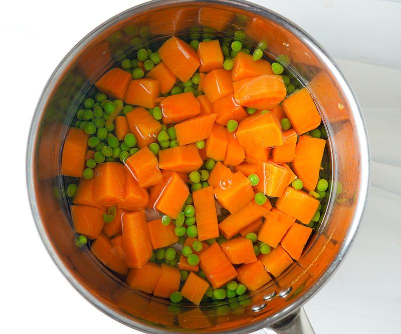 Add peas and cook with sweet potatoes