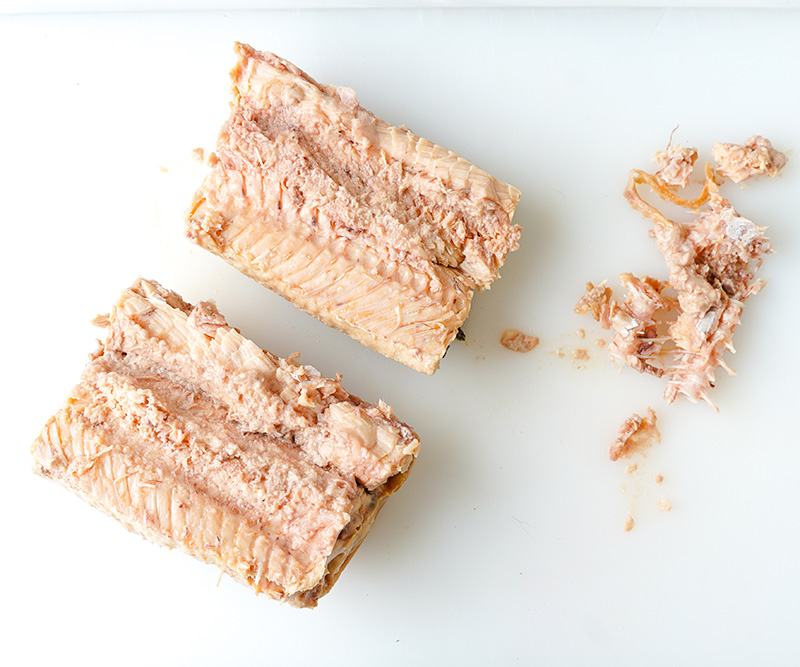 Prepare canned salmon for mixing