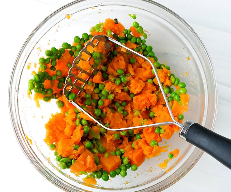 Mash the vegetables in a bowl