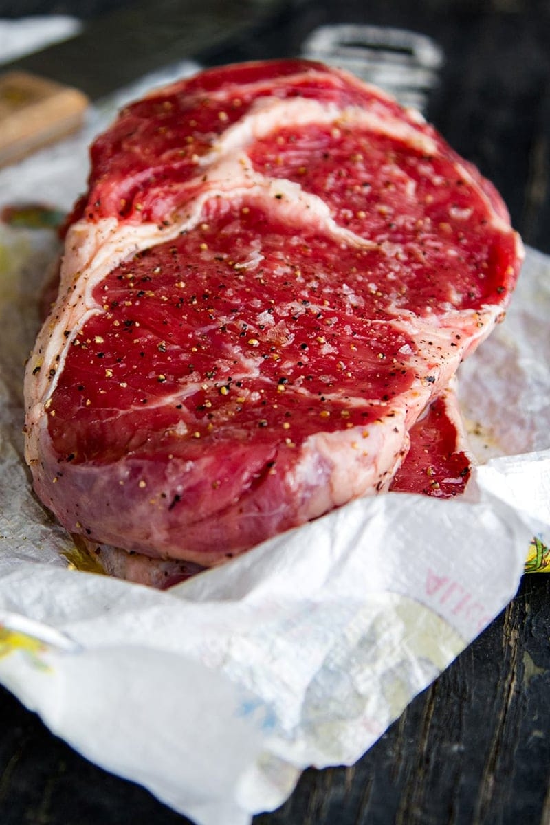 Preparing a scotch fillet steak for grilling