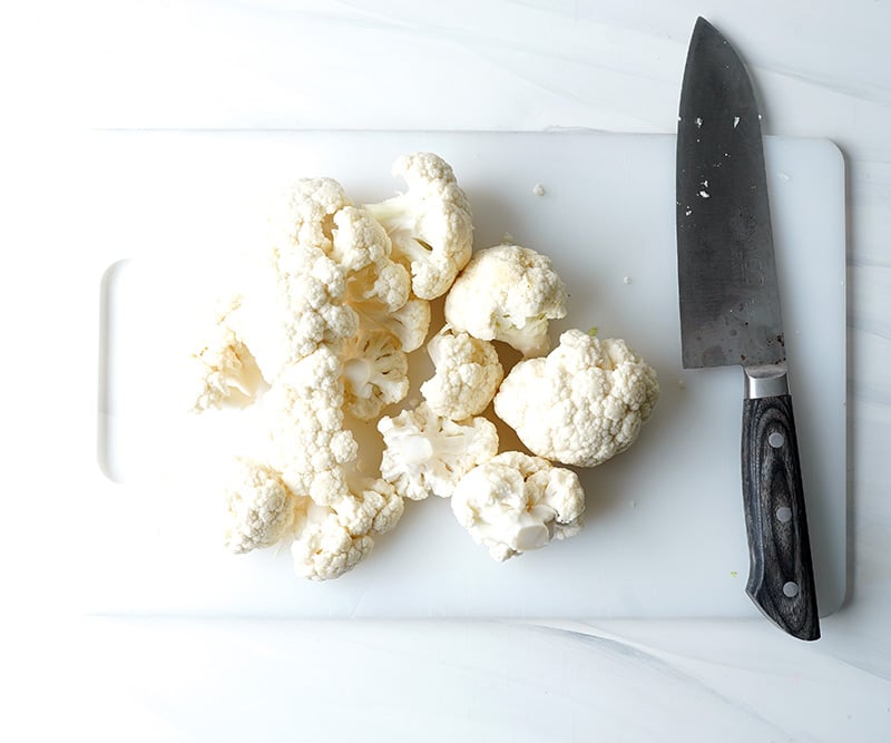 Making cauliflower rice for the dish