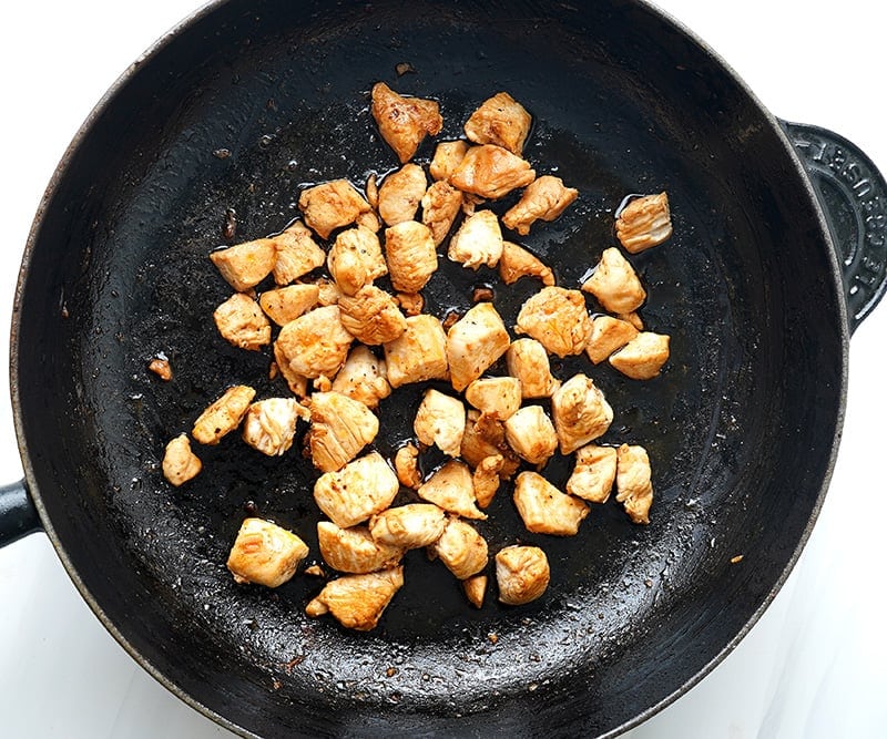 Cooking chicken for paella Spanish rice