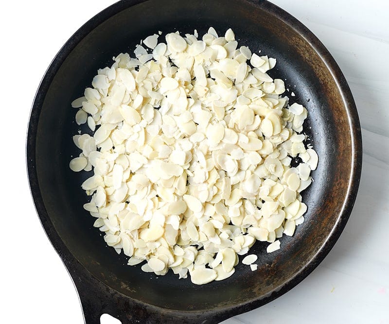 Toasting almonds in a pan