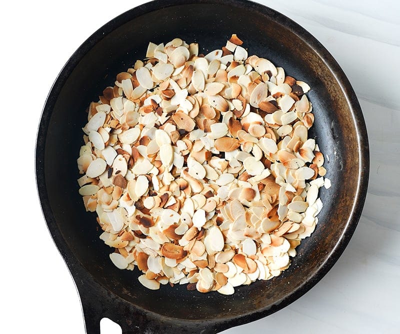 Toasting almonds in a pan