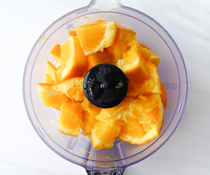 Oranges in a food processor