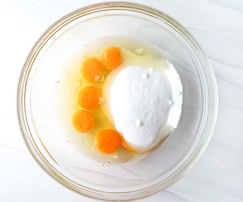 Eggs and sweetener in a bowl