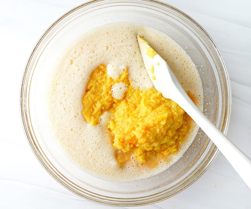 Adding orange puree to the batter