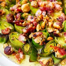 Roasted leeks with bacon and hazelnut dressing