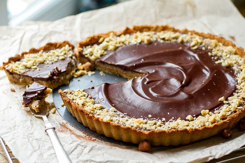 Paleo Chocolate Tart with Salted Caramel & Hazelnuts