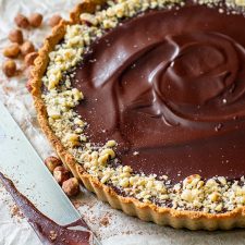 Paleo Chocolate Tart with Salted Caramel & Hazelnuts