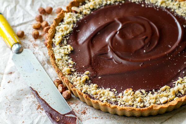 Paleo Chocolate Tart with Salted Caramel & Hazelnuts