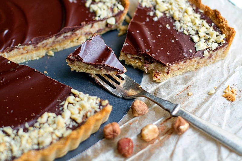 Paleo Chocolate Tart with Salted Caramel & Hazelnuts