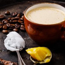 Homemade bulletproof coffee with coconut oil and ghee or butter