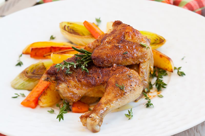 Roasted spatchcock chicken with vegetables