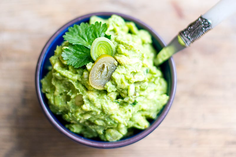 Guacamole with leeks and pickled jalapenos