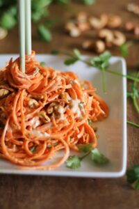 Raw Carrot Pasta With Ginger Lime & Peanut Sauce