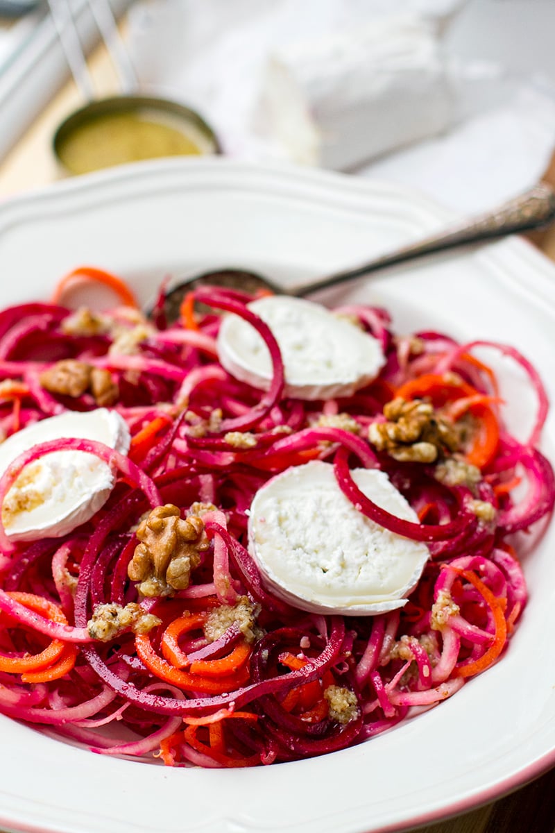 Raw beet and carrot salad with goat's cheese