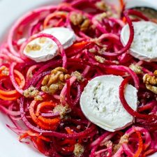 Raw beetroot salad with goat's cheese walnut dressing