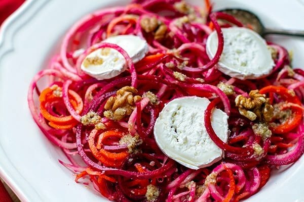 Raw beetroot salad with goat's cheese walnut dressing