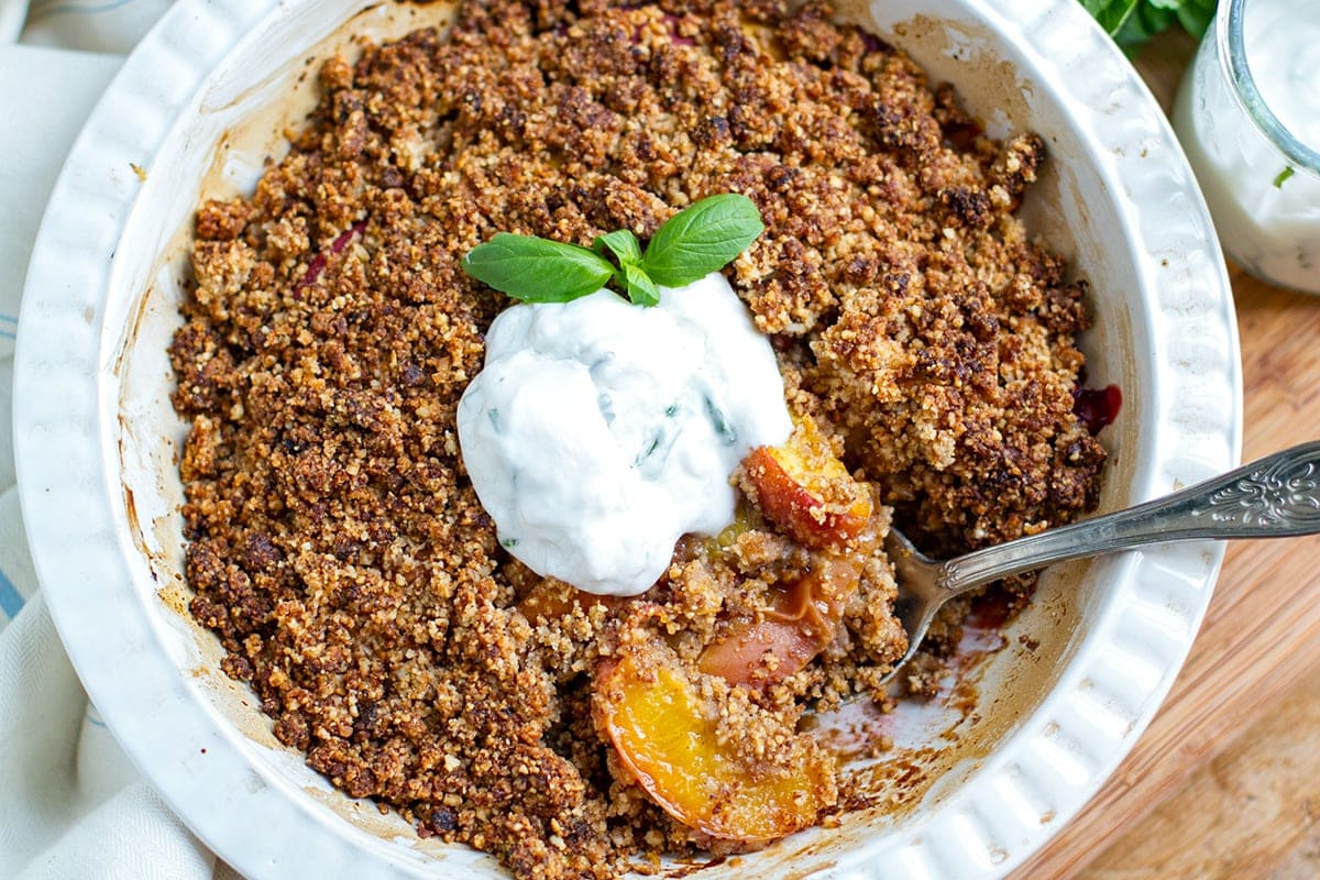 Paleo peach crumble with basil cream