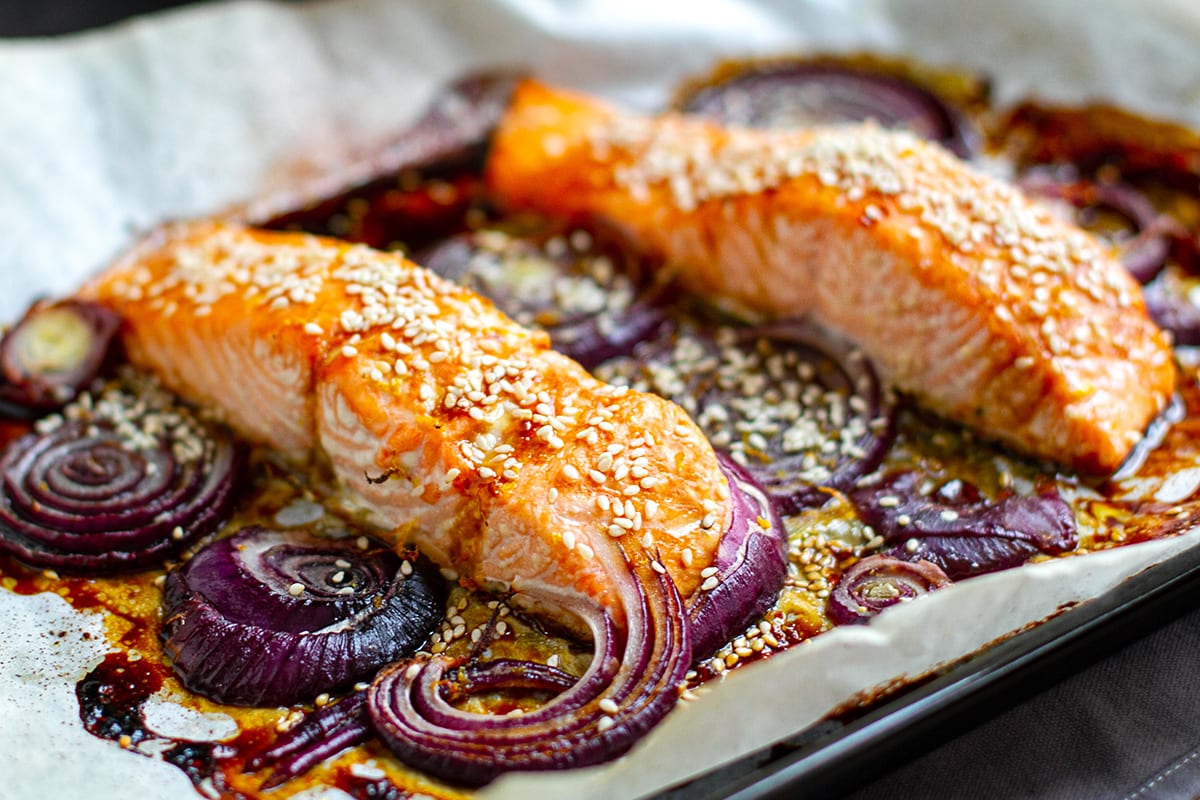 Paleo Teriyaki Salmon Baked With Onions & Sesame Seeds