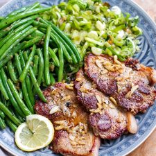 Garlic Pork Steaks With Green Beans & Fried Leeks