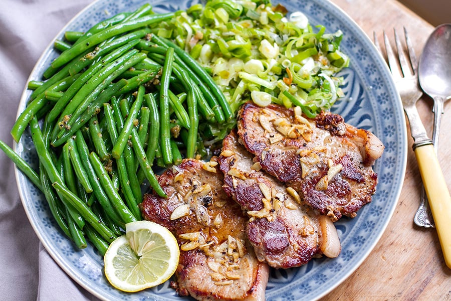 Garlic Pork Steaks With Green Beans & Fried Leeks