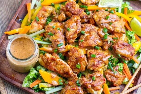 Crispy Chicken Thighs with Spicy Almond Sauce