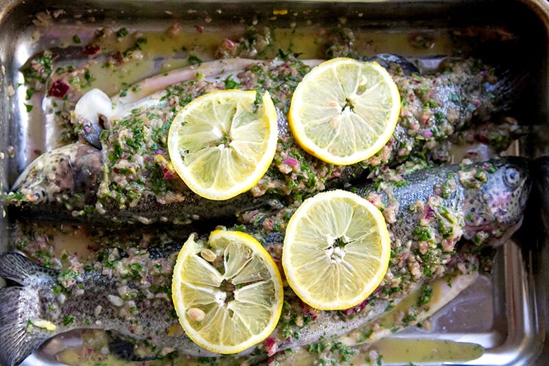 Baking whole trout with herbs and lemon