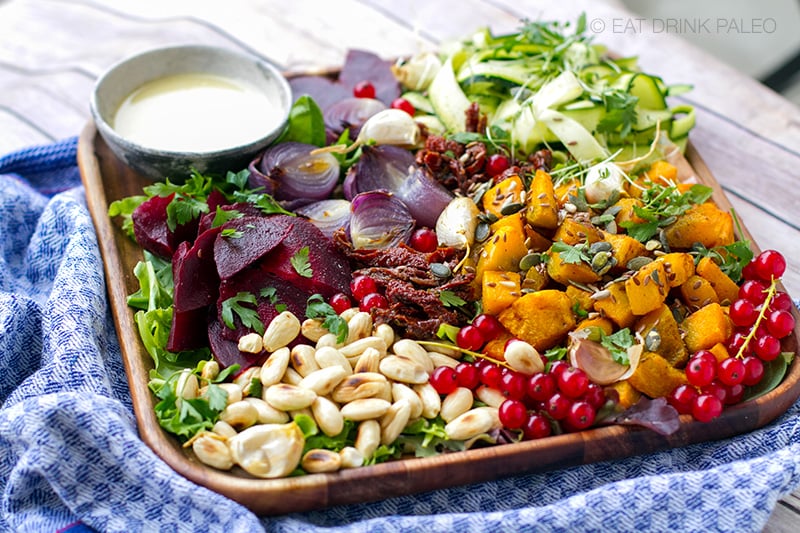 Fall salad with roasted squash and tahini garlic dressing