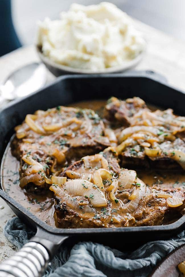 SMOTHERED PORK CHOPS SKILLET DINNER