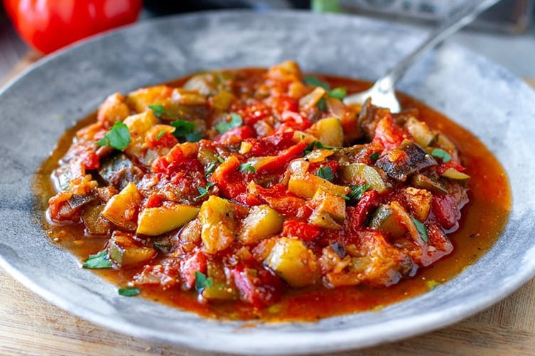 Spanish pisto vegetable stew with eggplant, zucchini, tomatoes and lots of olive oil