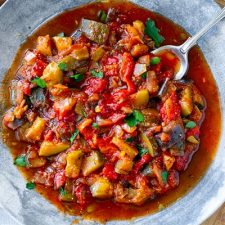 Spanish pisto vegetable stew with eggplant, zucchini, tomatoes and lots of olive oil