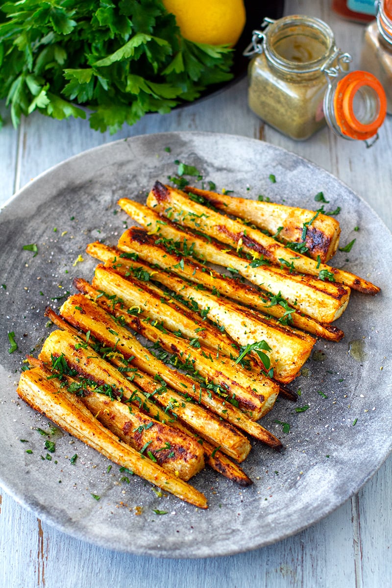 Roasted parsnips with spices, parsley and lemon