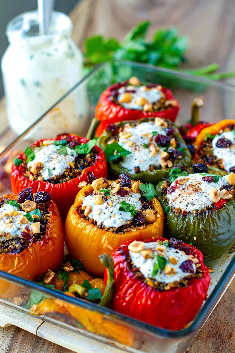 Quinoa Stuffed Peppers with hazelnuts, cranberries and garlic yoghurt ranch