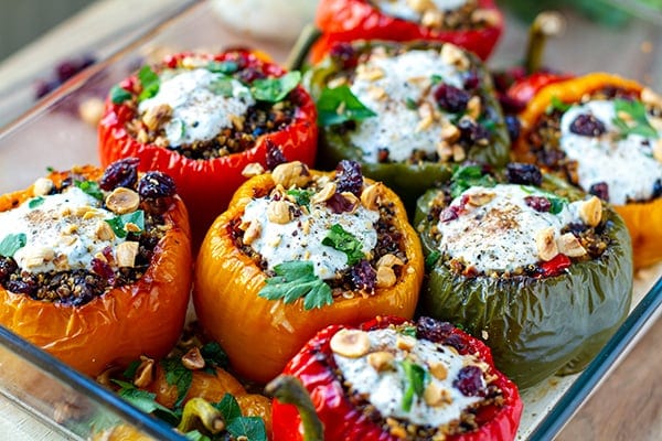 Quinoa Stuffed Peppers with hazelnuts, cranberries and garlic yoghurt ranch