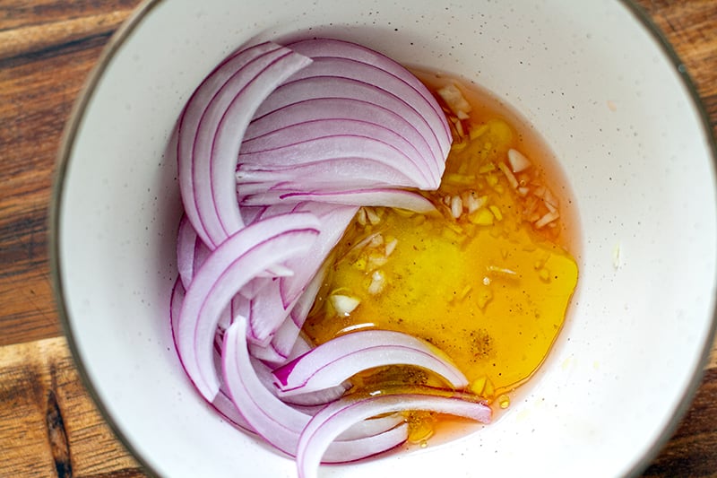 Red onions marinated with red wine vinegar dressing