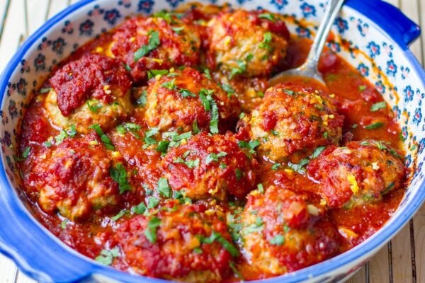 Chicken meatballs in tomato sauce.
