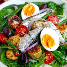 Nicoise salad with sardines and sun-dried tomato dressing