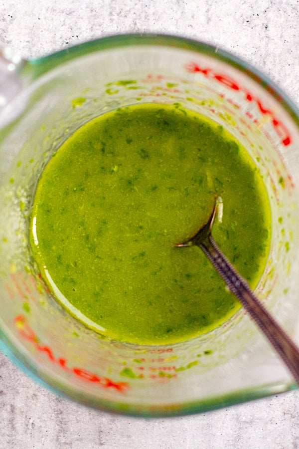 Lemon basil vinaigrette blended in a jar