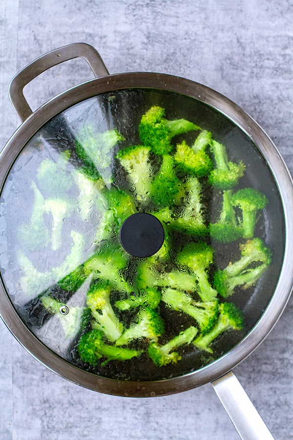 Pan fry broccoli under lid first