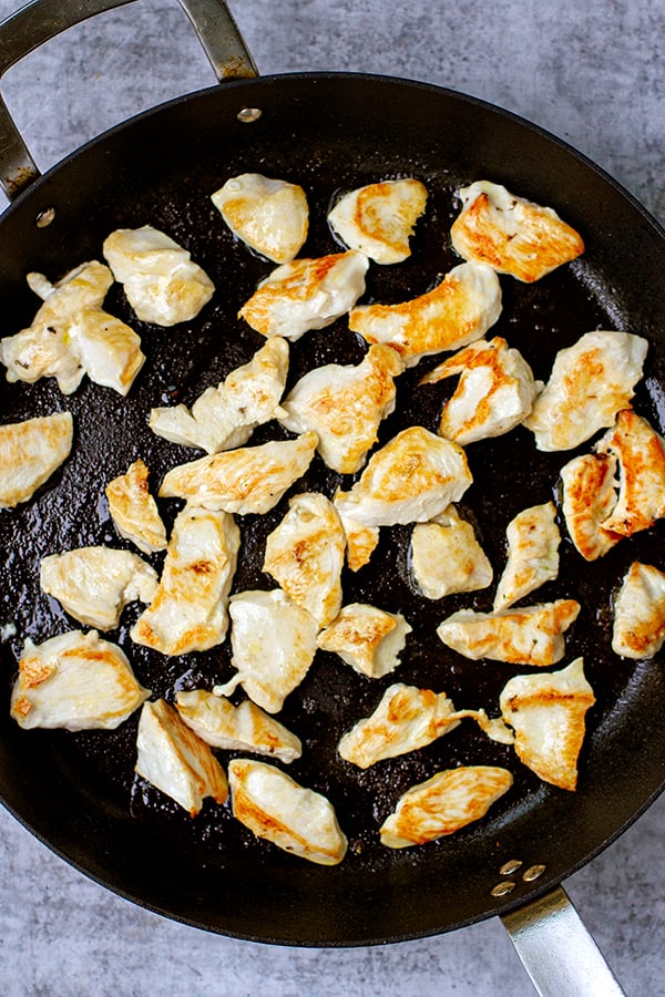 Pan fry chicken breast for stir fry