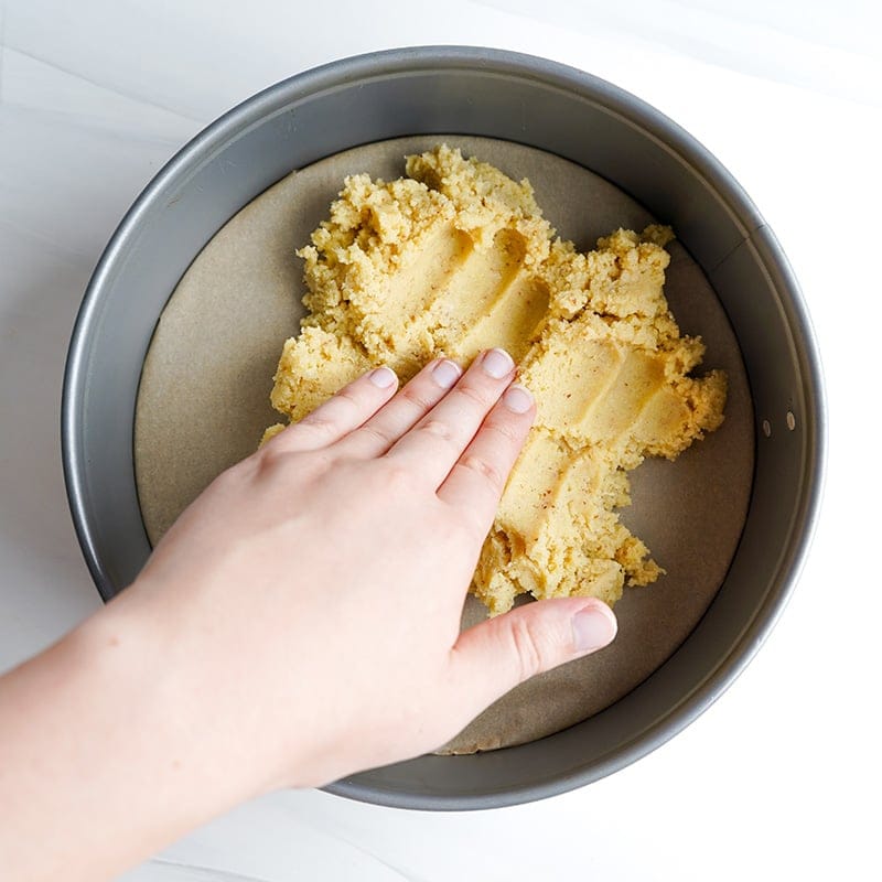 Press down the cheesecake crust in a pan