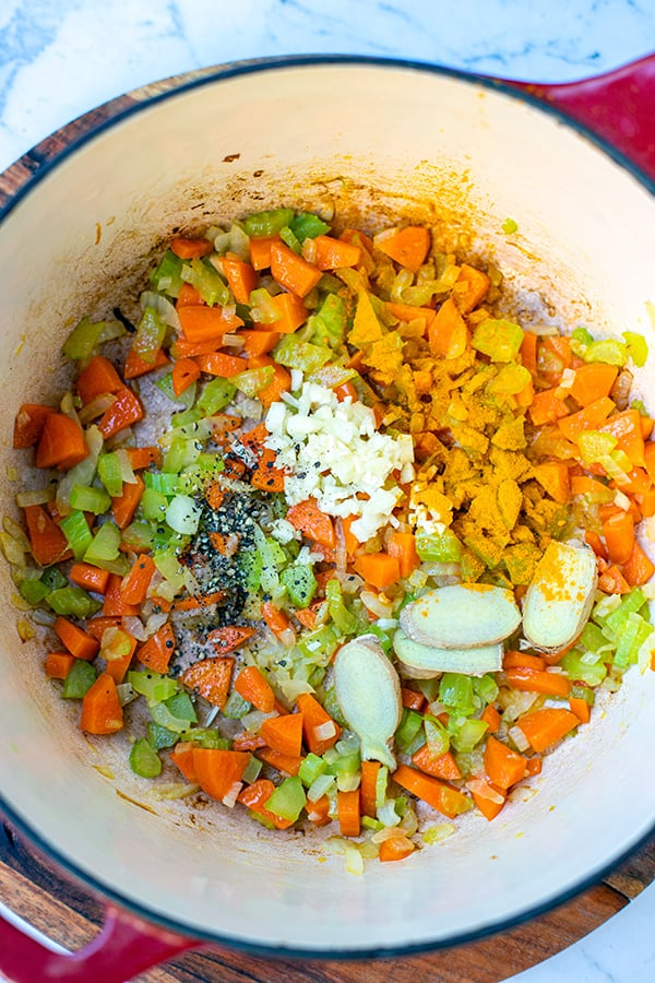 Add seasoning to the sauteed vegetables