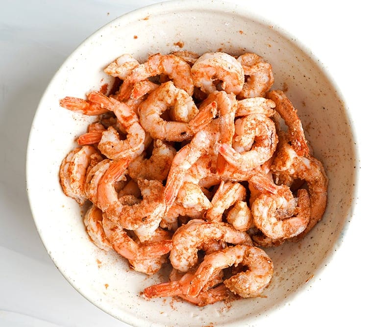 Coat the shrimp in the spice rub