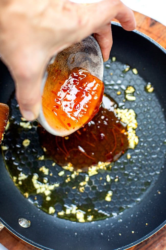 Add sweet chili sauce to the pan