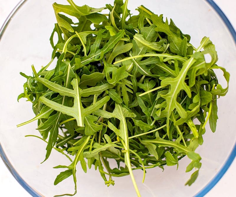 Rocket leaves salad in a bowl 