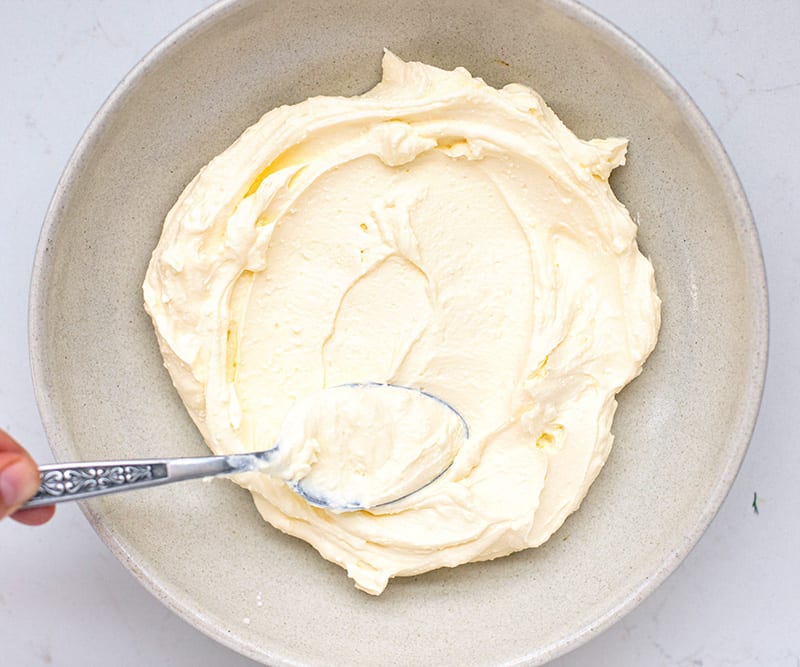 Spread whipped feta in a bowl