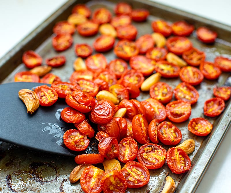 Cherry tomatoes and garlic after roasting
