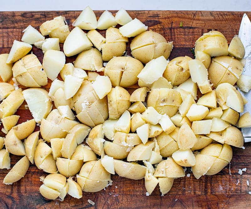 Once cooled, cut potatoes into cubes